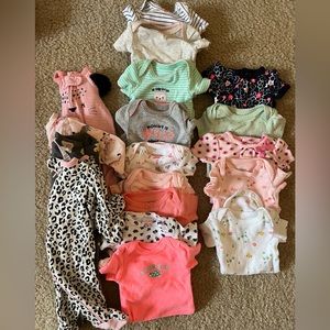 Bag of used but in a very good condition preemie clothes.